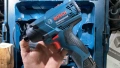 НОВ Акумулаторен ударен гайковерт Bosch GDR 120-LI, 12 V, 100 Nm, 2 батерии 2.0 Ah, зарядно и куфар , снимка 1