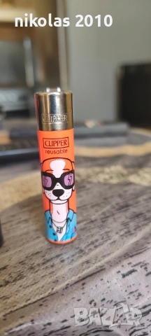 Колекция от 37 оригинални запалки Clipper + подарък дисплей (поставка), снимка 16 - Колекции - 54563525