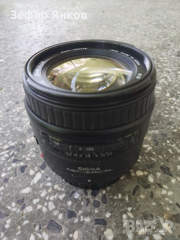 Обектив : Sigma 28mm f/1.8 Aspherical за Canon, снимка 2 - Обективи и филтри - 55071379