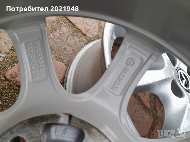 Продава оригинални алуминиеви джанти Мазда,Форд,15 цола,4 дупки, снимка 9 - Гуми и джанти - 54633339