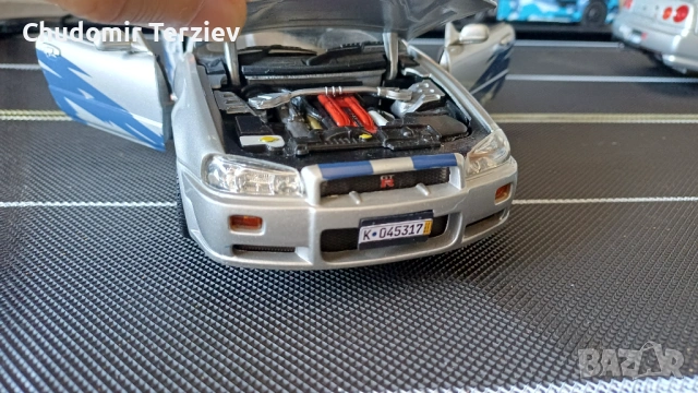 Мащабни модели коли 1:18 Nissan Skyline GTR R34, снимка 9 - Колекции - 54911522