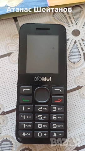 телефон Alcatel