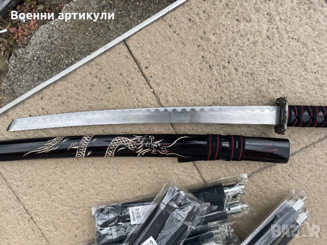 Меч метале с дървена калъв монжаго