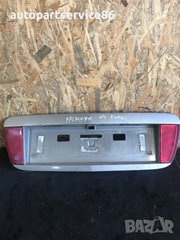 Лайсна на багажника с място за регистрационен номер сребрист цвят за Nissan Primera P12 (2004) 90810