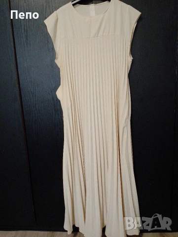 Плесирана рокля