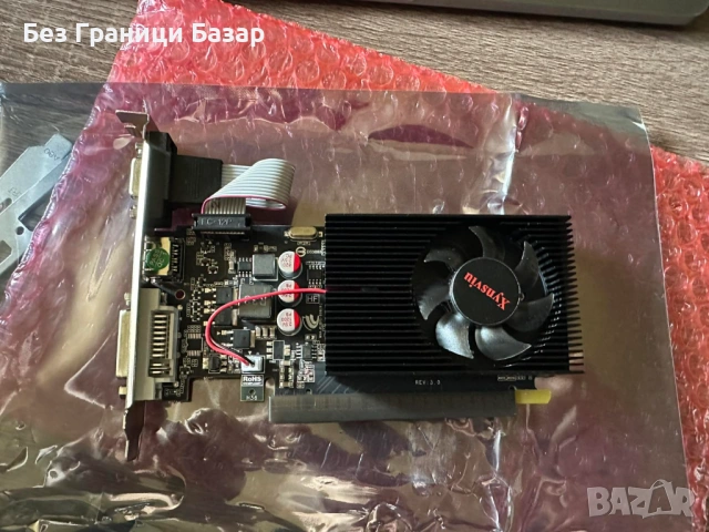 Нова GT 210 1GB DDR3 low profile видео карта HDMI DVI VGA, снимка 2 - Друга електроника - 54572118