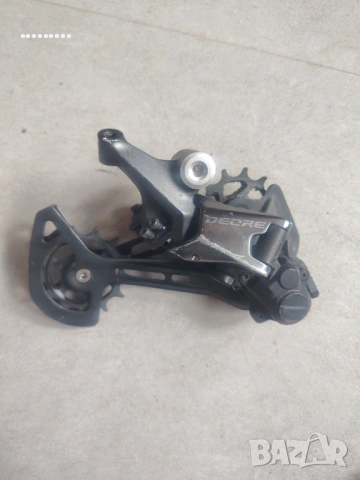 Обтегач Дерайльор Shimano RD-M6100