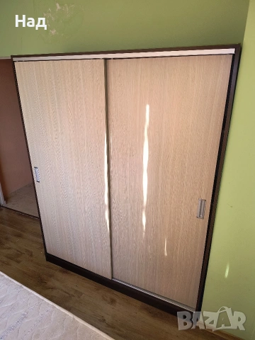 Гардероб с плъзгащи врати