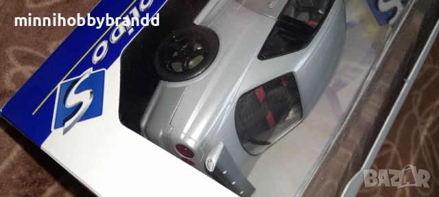 Nissan Skyline GtR R 34 1.18 Solido , снимка 7 - Колекции - 54484436