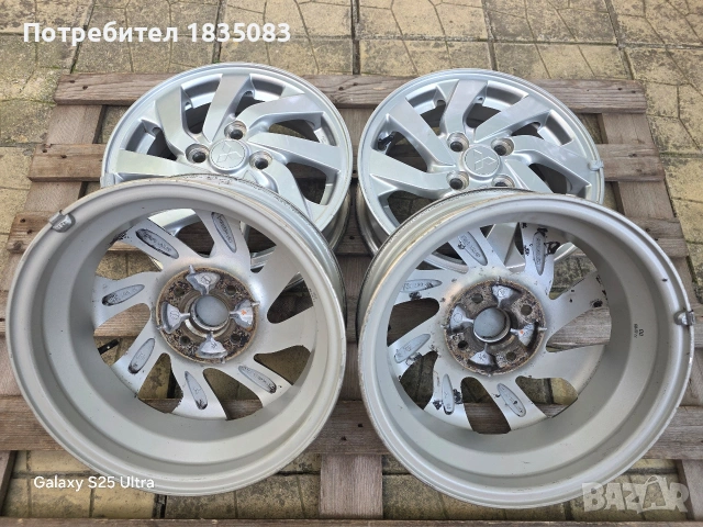 Лети джанти 14ки 4х100 Mitsubishi, снимка 11 - Гуми и джанти - 55178909