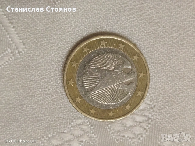 монета от 1 евро... Германия 2002 г.