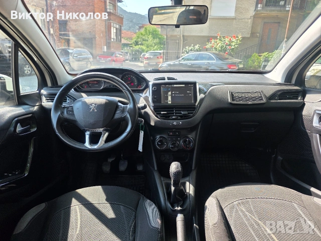 Peugeot 208 , 2014г. Газ / Бензин 1.4i Климатик, снимка 8 - Автомобили и джипове - 54798149
