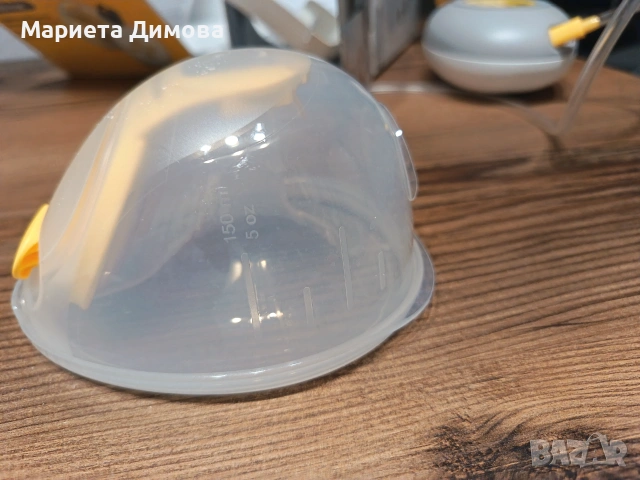 Двуфазна електрическа помпа Medela - Solo Hands - Free, снимка 7 - Помпи за кърма - 55247340