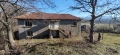 Урегулиран парцел 1500 кв.м. с ток, вода и стара къща в с. Дружинци, снимка 2