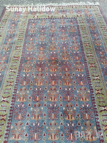 Ръчно тъкан килим