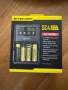 NITECORE SC4 универсално интелигентно бързо зарядно за Li-ion и Ni-MH батерии, LCD дисплей и 4 слота, снимка 1