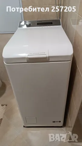 Продавам пералня AEG с горно зареждане AEG L74270TLE, 7 кг, Made in France
