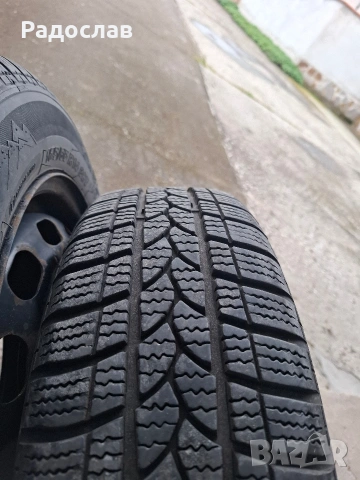 Железни джанти 14" Форд с зимни гуми, снимка 13 - Гуми и джанти - 54025741