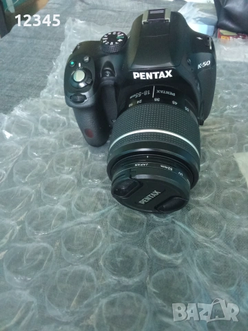 Продавам професионален фотоапарат Pentax K50 
