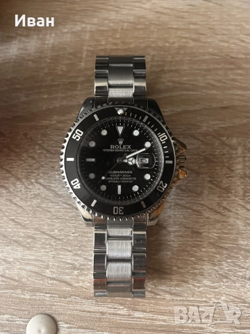 Rolex GMT Master silver black -
Bruce Wayne