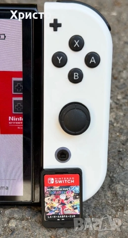 Игрова конзола Nintendo Switch OLED  + игра Mario Kart 8 Deluxe + 64GB карта  , снимка 7 - Nintendo конзоли - 54797939