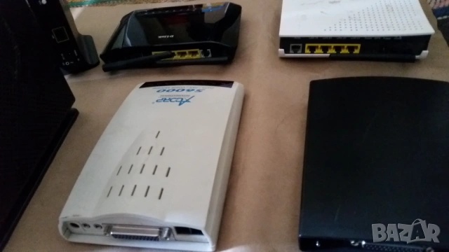 осем ADSL рутери и два модема, снимка 6 - Рутери - 54288524