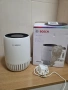 Пречиствател за въздух Bosch Air 1000 с компактен цилиндричен дизайн. , снимка 1