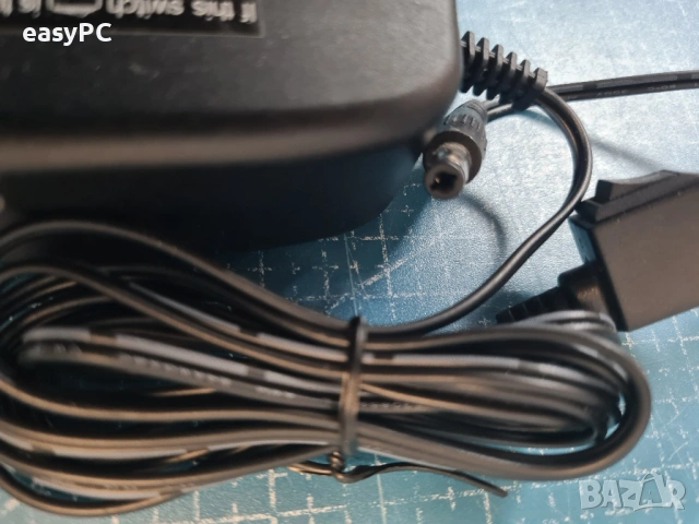 Оригинален захранващ адаптер NETGEAR 332-10538-01 AD810000 007-3LF 12V 1A, снимка 3 - Друга електроника - 54602599