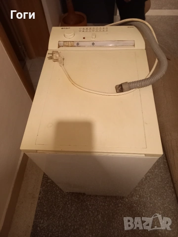 Пералня INDESIT с горно зареждане 