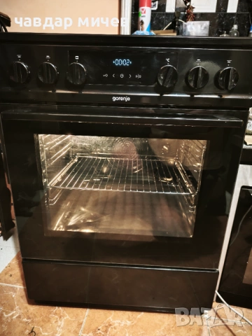 Черна свободно стояща печка Gorenje 