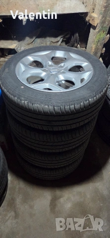 Оригинални джанти Ford 16 5x1x08, снимка 2 - Гуми и джанти - 54349475