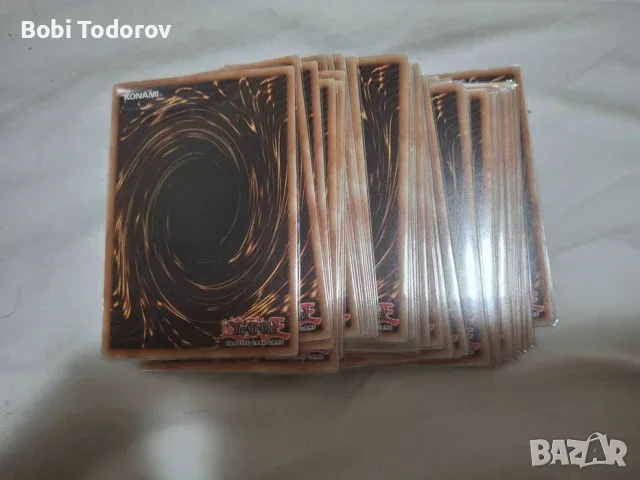 Оригинални карти yu-gi-oh TCG и GX с протектори, снимка 2 - Карти за игра - 55377954