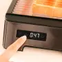 Cecotec NiceSlice Touch е хоризонтален тостер с мощност 1000 W, снимка 4