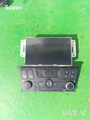 Контролен панел за аудио система и климатроник за Nissan Almera II (N16) Nissan Almera Tino