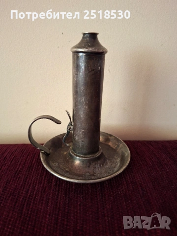 Старинен сребърен свещник
