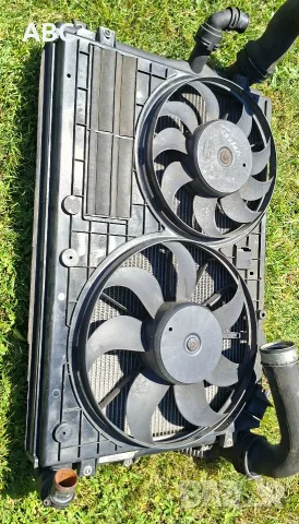 Радиатори + пирки Vw Touran 2.0 tdi , снимка 2 - Части - 55465471
